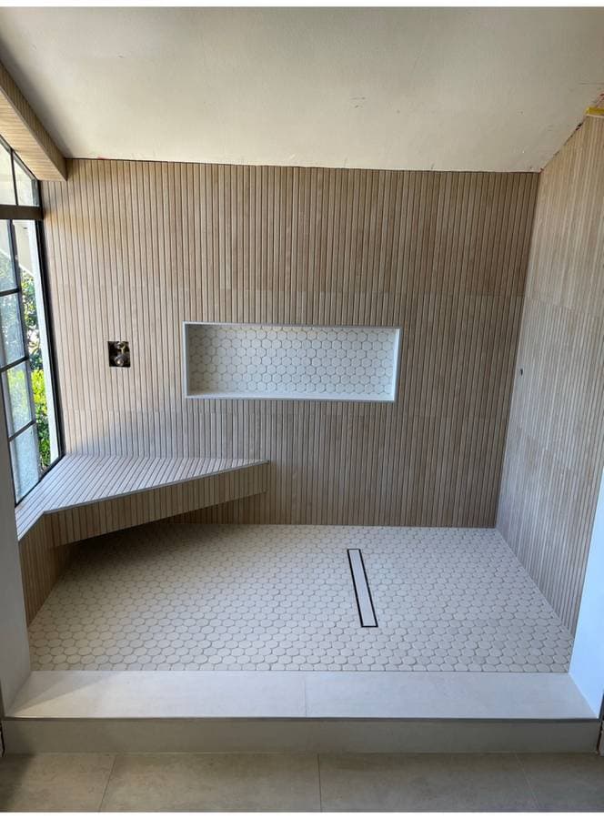 Picture of a custom wood and tile sauna for a residential home